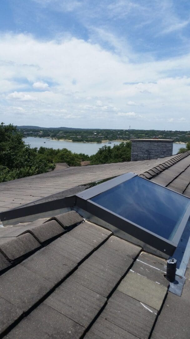 A solar panel on the roof of a house