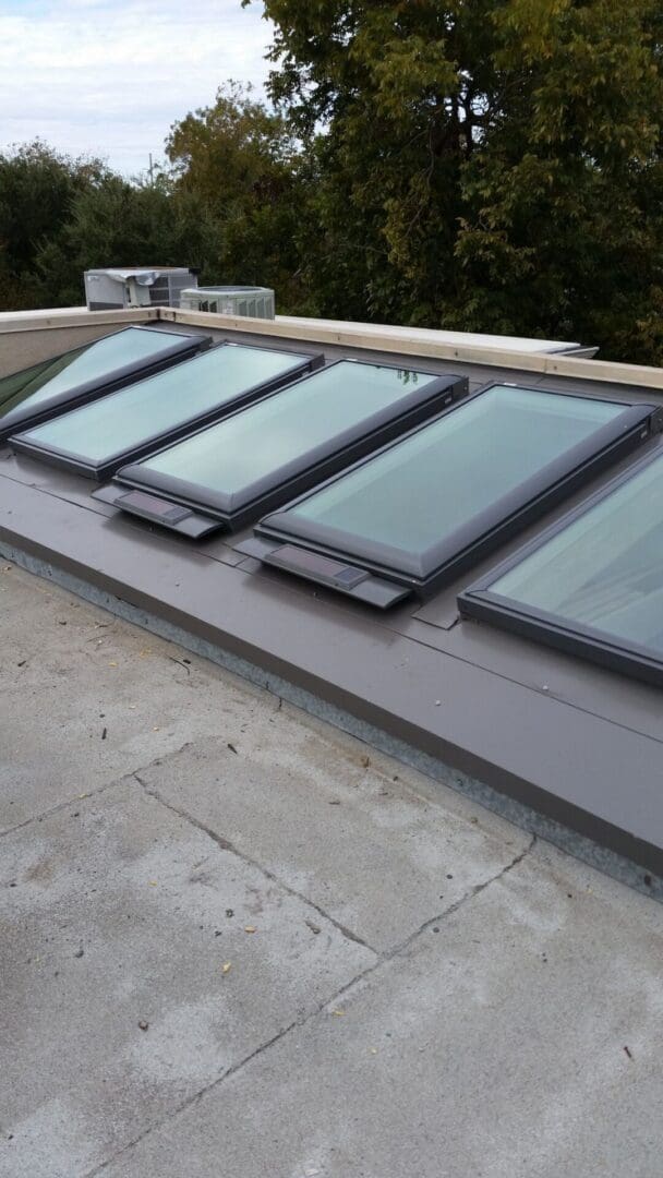 A group of skylights on the roof of a building.